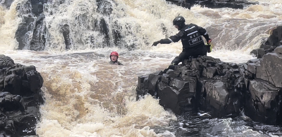 Unit 7 Safety team directing performer on River Tees rapids